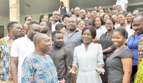 Prosper Afenyo (left) interacting with some of the participants
